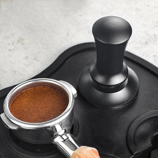 tamper noir cafe moulu presser