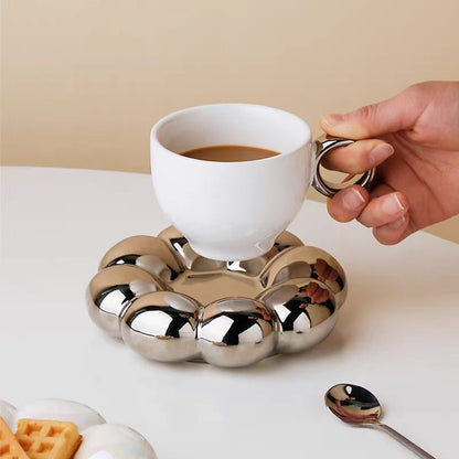 tasse cafe argent table